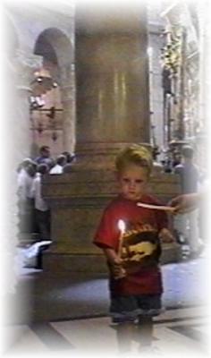 Holy Sepulcher Church. Holy Sepulcher is just behind the column. Ortodox Easter 1999.